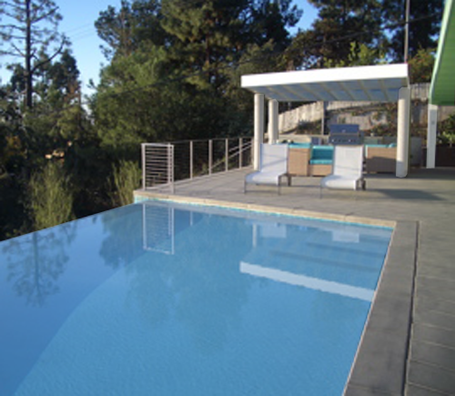 POOL ANCHORED BY TRELLISED PAVILION